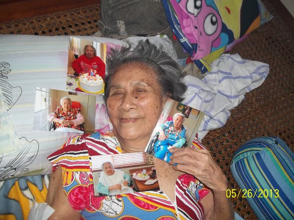 grandma gained weight, less pain, cuts a smile with picture of sister